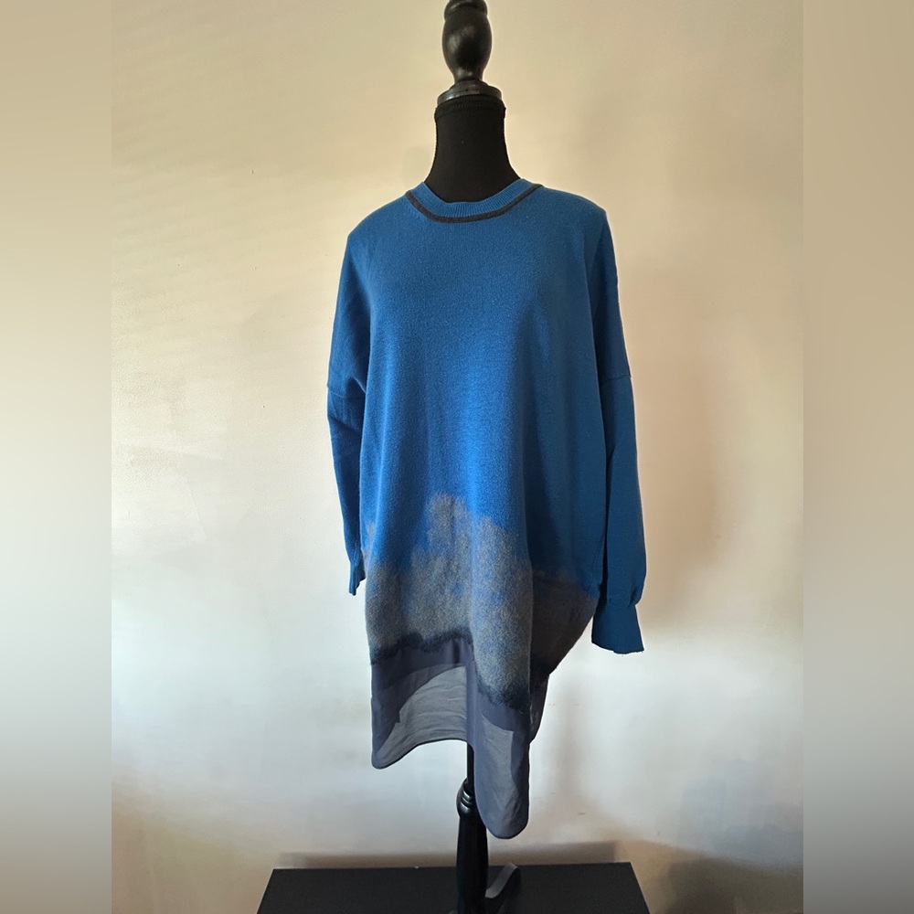 Initial knit sweater.